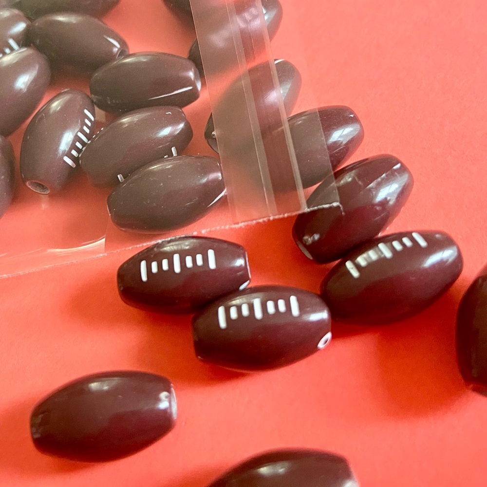 New. 🏈 Pack of 52 football beads for arts and crafts, jewelry making, charms